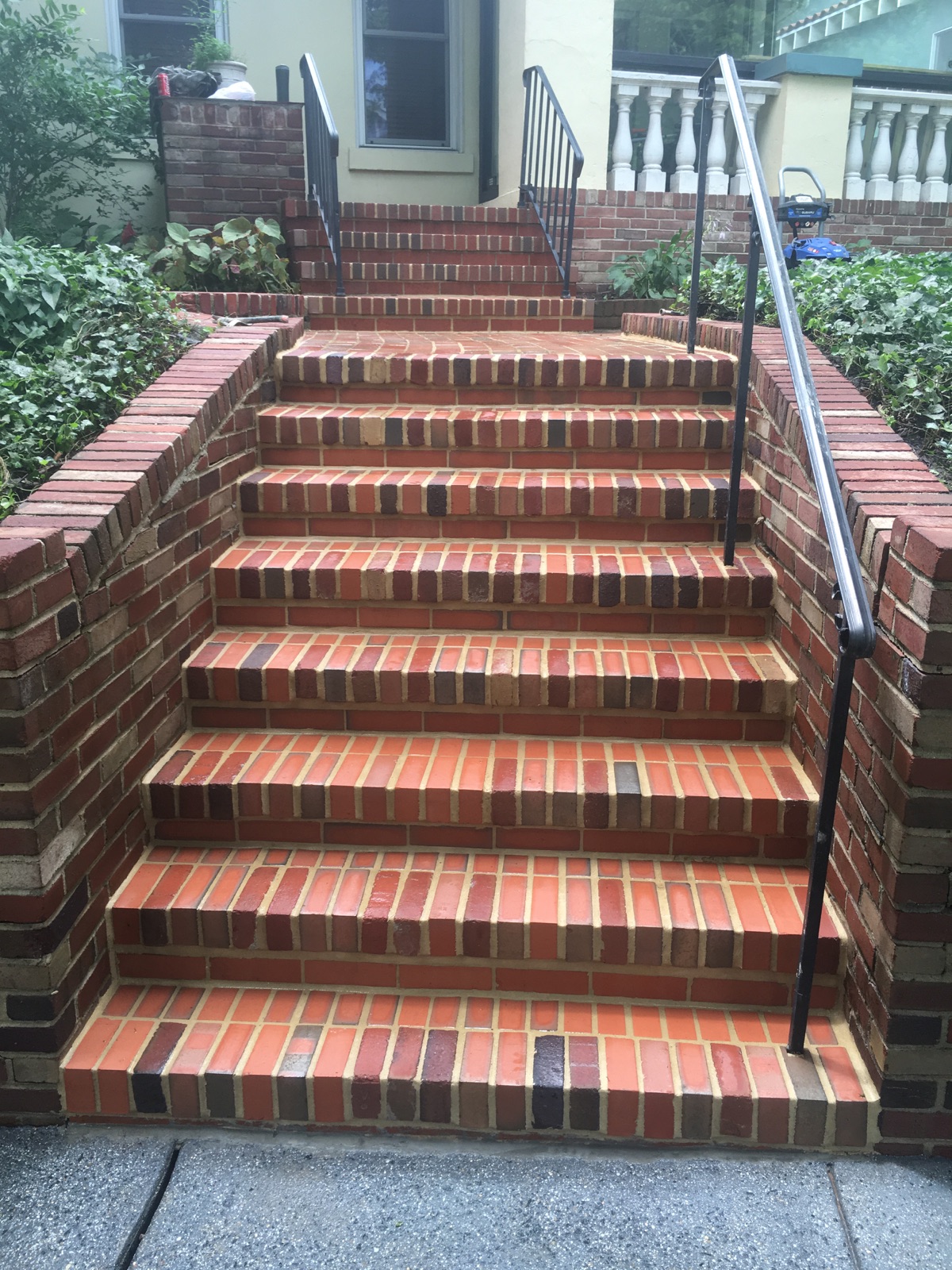 Restored brick steps and masonry entrance